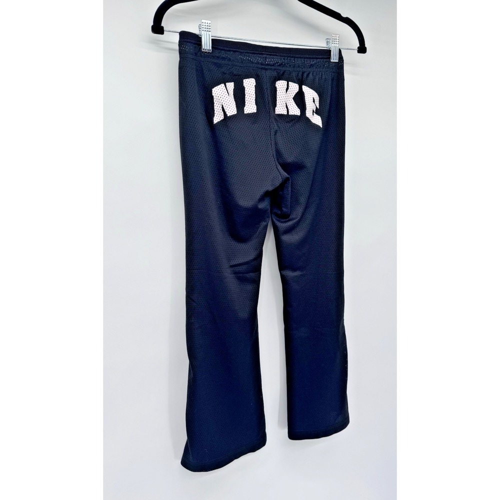 Nike girl M mesh lined snap side back logo flare pants athletic Y2K 90s preppy